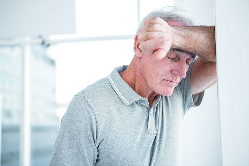 HGH Effects on Skin Sad Grey Haired Man