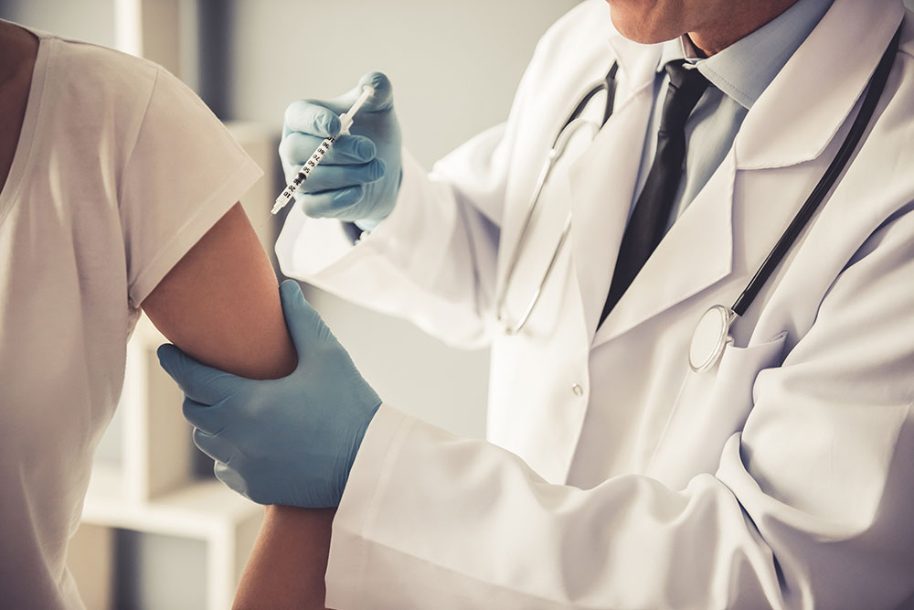 Testosterone Injection Site Pain Doctor Making an Injection