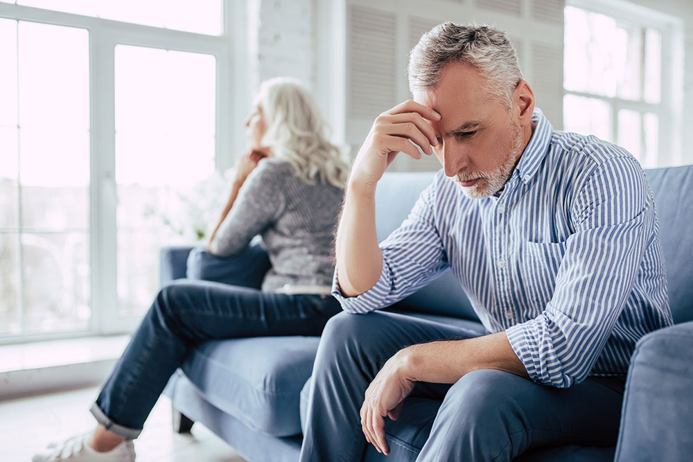 Testosterone Injection Site Pain Middle-Aged Man Sitting